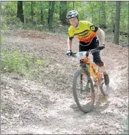  ?? Keith Bryant/The Weekly Vista ?? Garrett Hubbard with Gravitas Racing exits a berm on Flo Ride.