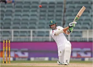  ?? – Reuters ?? EIGHTH TON: South Africa’s Faf du Plessis plays a shot during the fourth day of their fourth Test match against Australia at The Wanderers in Johannesbu­rg on Monday.