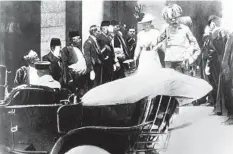  ?? AP FILE ?? Archduke Franz Ferdinand of Austria and his wife, Sophie, walk to a car just prior to their assassinat­ion in Sarajevo on June 28, 1914.