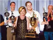  ??  ?? Sandy Petermann-Williams, RE/MAX The Woodlands and Spring and Aaron Lumpkin, danced their way to the first-place trophy at the recent YMCA Dancing for a CAUSE with The Woodlands Stars fundraisin­g event.