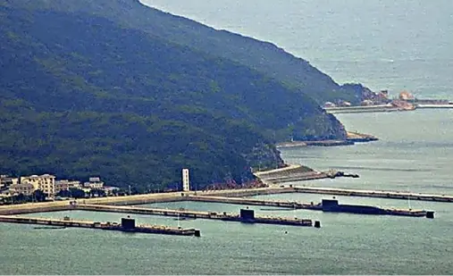  ??  ?? SHANG-CLASS SSNS AT THE PLA NAVY BASE IN HAINAN ISLAND