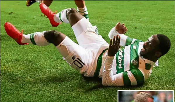  ?? — Reuters ?? What a feeling: Celtic’s Moussa embele celebrates after scoring the second goal against Astana in the Champions League third qualifying round second-leg match at Celtic Park on Wednesday. Inset: Celtic manager Brendan Rodgers rejoicing after their win.