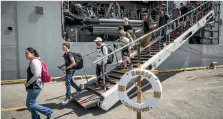  ??  ?? After a safe night at sea, the volunteers disembarke­d at Nelson.