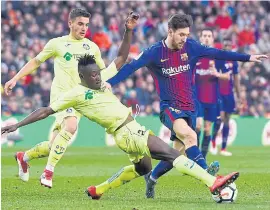  ??  ?? THE MAGICIAN: Dakonam Djene, left, vies with Lionel Messi during a match between Barcelona and Getafe. Ramon Maddoni hopes to discover the next Messi.