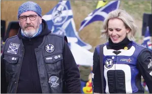  ?? ?? TOGETHER IN LEATHER: Stewart Hosie with Serena Cowdy, who is now his wife