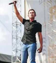  ?? THE ASSOCIATED PRESS ?? Scotty McCreery is finding his footing after rising to fame on American Idol, and subsequent­ly losing his label.