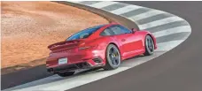  ?? PORSCHE ?? A Porsche roars around the track at the new Porsche Experience Center in Carson, Calif. It offers eight “training modules.”