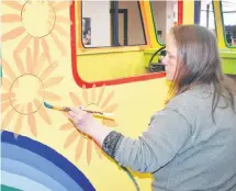  ?? ADAM MACINNIS/THE NEWS ?? Sharon McKenna was busy painting a “bus” that will be part of this year’s March break activities at the Museum of Industry in Stellarton.