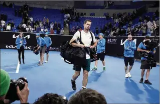  ?? NG HAN GUAN/AP ?? Andy Murray leaves Margaret Court Arena after 4 a.m. during last year’s Australian Open in Melbourne. Murray’s second-round victory over Thanasi Kokkinakis lasted more than 4½ hours. The men’s and women’s tours have introduced new scheduling guidelines to prevent such a scenario.