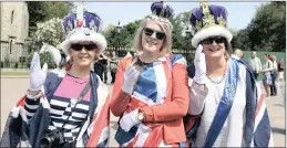  ??  ?? WAITING: Royal supporters gather outside Windsor Castle yesterday. PICTURE: EPA