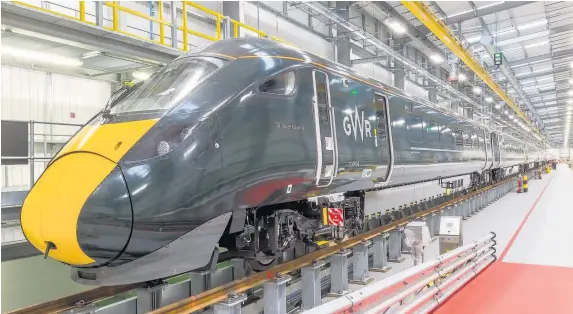  ??  ?? > How the Hitachi class 800 bi-mode trains will look on the Great Western Mainline
