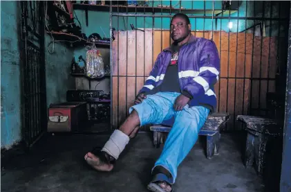  ?? PHOTOS: TSHEPISO MABULA KA NDONGENI ?? SALOMAO CARLOS MACAMO SITS INSIDE THE SMALL TUCKSHOP HE RUNS IN HIS HOME IN MPUMALANGA.