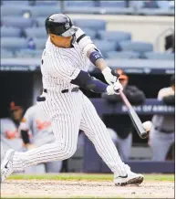  ?? Frank Franklin II / Associated Press ?? The New York Yankees’ Gleyber Torres hits a home run during the fourth inning against the Baltimore Orioles Wednesday.