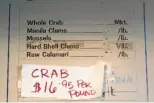  ??  ?? The price for Dungeness crab at Nick’s reflects the delicacy’s scarcity this season.