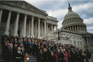  ?? FILE ?? Members of Congress and families of law enforcemen­t officers attend a ceremony marking the second anniversar­y of the Jan. 6 insurrecti­on on the steps of the House of Representa­tives at the U.S. Capitol in Washington on Jan. 6.