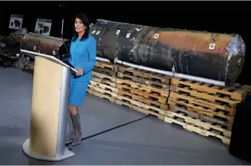 ?? (Yuri Gripas/Reuters) ?? US AMBASSADOR to the UN Nikki Haley briefs the media in front of remains of an Iranian ‘Qiam’ ballistic missile at Joint Base Anacostia-Bolling in Washington in December 2017.