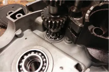  ??  ?? The bearing in place, supporting the camshaft / input gear shaft to the gearbox. Main crank bearing has a sleeve next to it which directs the oil from the pump to the crank shaft oil drilling and on up to the cylinder head