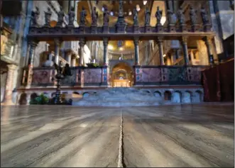  ?? ?? Signs of erosion are visible Dec. 7 inside St. Mark’s Basilica in Venice.