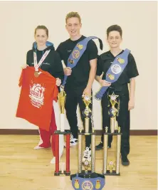  ??  ?? Pictured with their trophies are, from the left, Bethany Jones, Jake Peppercorn and Lianne Jones.
