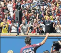  ?? Picture: AFP PHOTO ?? NEW BEGINNINGS: Paris Saint-Germain’s Brazilian forward Neymar waves to the crowd during his presentati­on to the fans at the Parc des Princes stadium in Paris on Saturday