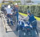  ?? Photo / Supplied ?? Dirt bikes seized during search warrants are loaded on to a tow truck in Whangārei.