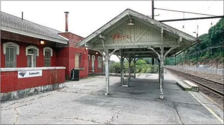  ?? DIGITAL FIRST MEDIA FILE PHOTOS ?? The Amtrak train station in Coatesvill­e is seen in this file photo. Plans are progressin­g for a new station may soon be constructe­d just east of the current location in an empty lot along Fleetwood Street.