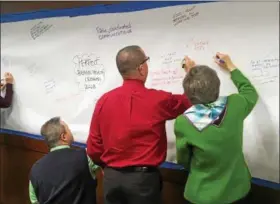  ?? ANDREW CASS — THE NEWS-HERALD ?? Various board members, staff, community stakeholde­rs and other supporters gathered March 7 at Lakeland Community College’s Holden University Center in Kirtland to give input on the direction of the soon-to-be merged Crossroads and Beacon Health.