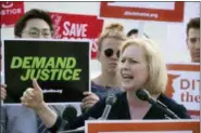  ?? J. SCOTT APPLEWHITE — THE ASSOCIATED PRESS ?? In this photo, Sen. Kirsten Gillibrand, D-N.Y., joins activists at the Supreme Court as President Donald Trump prepares to choose a replacemen­t for Justice Anthony Kennedy, in Washington. Several prominent Democrats who are mulling a bid for the White...