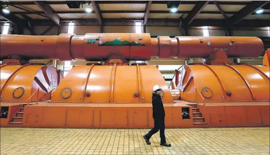  ?? Photograph­s by Luis Sinco Los Angeles Times ?? INTERMOUNT­AIN has been supplying one-fifth to one-third of L.A.’s electricit­y in recent years. Above, one of two steam turbines at the plant.