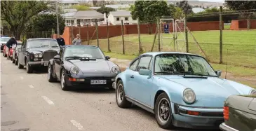  ??  ?? It’s not often you see a couple of Porsches and a Rolls Royce parked outside your school field ‒ even if it is St Andrew’s.