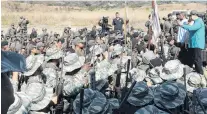  ?? PHOTO: REUTERS ?? Rallying the troops . . . Venezuela’s President Nicolas Maduro speaks to soldiers during a military exercise in Valencia, Venezuela, yesterday.