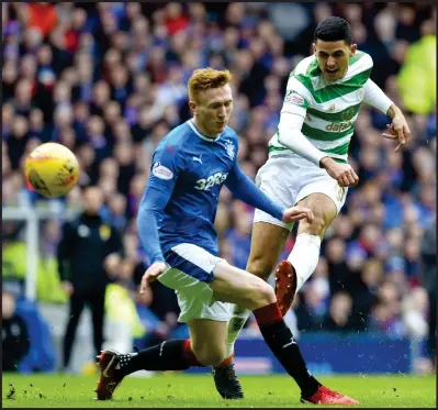  ??  ?? Tom Rogic fires in a superb equaliser to, injuring the unfortunat­e David Bates in the process