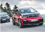  ??  ?? The new BMW i3, right, has a bit more power than the standard model, as well as a sportier suspension.