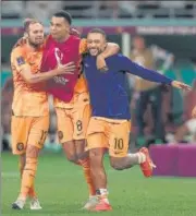  ?? AFP ?? Netherland­s players celebrate their win on Saturday.