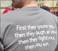  ?? (AP/Wayne Parry) ?? Ray Jensen Jr., assistant director of the United Auto Workers Region 9 office, shows his T-shirt during an anti-smoking rally in Trenton, N.J., earlier this month.