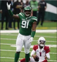  ?? SETH WENIG - THE ASSOCIATED PRESS ?? New York Jets defensive end John Franklin-Myers (91) reacts after sacking Arizona Cardinals quarterbac­k Kyler Murray (1) during the second half of an NFL football game, Sunday, Oct. 11, 2020, in East Rutherford.