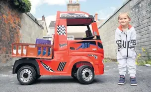  ?? Picture: Gayle Marsh ?? Three year-old Theo Jenkins of Llanelli loaded his toy truck and made deliveries to a local care home and ambulance station.