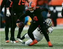  ?? RON SCHWANE/ASSOCIATED PRESS ?? Deshaun Watson has been sacked eight times in his first four games with the Browns, with just two TD passes.