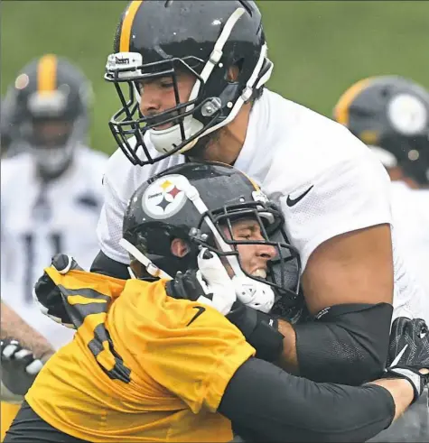  ?? Peter Diana/Post-Gazette ?? Alejandro Villanueva, right, said he always has been more focused about making the team in his career, not on how much money he should make. A former Army Ranger, he didn’t sign with an NFL team until 2014 but will turn 29 in September.