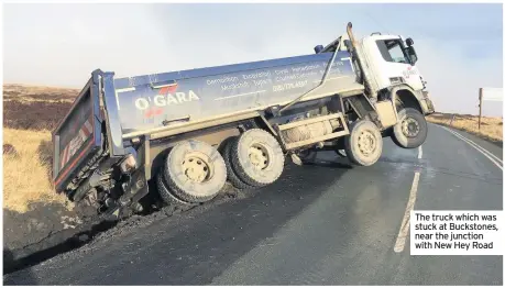  ??  ?? The truck which was stuck at Buckstones, near the junction with New Hey Road