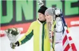  ??  ?? ARE: Third placed US’ Lindsey Vonn (R) poses with former Swedish ski champion Ingemar Stenmark during the flowers ceremony after the Women’s Downhill event of the 2019 FIS Alpine Ski World Championsh­ips at the National Arena in Are, Sweden yesterday. — AFP