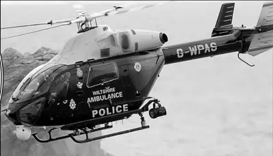  ??  ?? Left: Robert Symons who was arrested for protesting at the noise from the Wiltshire police helicopter (above)