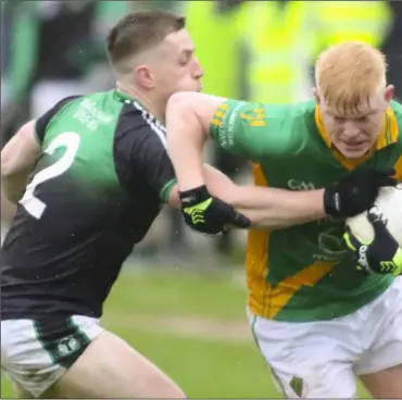  ??  ?? Centre-forward Daire Bolger taking on Blackhill Emeralds defender Ryan Courtney.