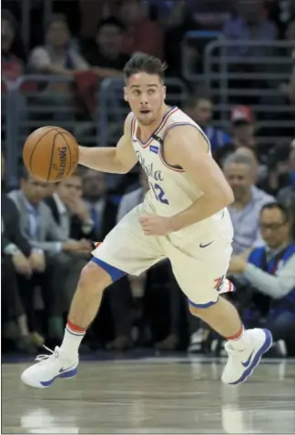  ?? MATT SLOCUM — THE ASSOCIATED PRESS ?? As the chants of ‘ T. J.! T. J.!...’ poured down from admiring Wells Fargo Center fans recognizin­g great work fromguard T. J. McConnell ( above) in Game 4Monday night, rookieMark­elle Fultz, riding the Sixers’ bench behind McConnell in the postseason,...