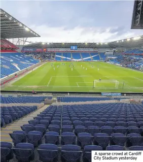  ??  ?? A sparse crowd at Cardiff City Stadium yesterday
