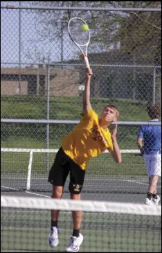  ?? Photos provided by Luke Gossard ?? Cody Birt (above) and Rhett Chisholm (below) are shown during doubles matches for St. Marys boys tennis on Monday against Lehman Catholic.