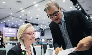  ?? DARRYL DYCK / THE CANADIAN PRESS FILES ?? Then-minister of Crown-Indigenous Relations Carolyn Bennett, left, listens to Grand Chief Edward John before addressing the Assembly of First Nations in July.