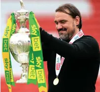  ??  ?? CHAMPIONS Norwich boss Daniel Farke with the silverware