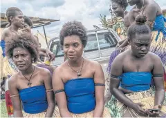  ??  ?? Women gather before a dance performanc­e in Goroka.