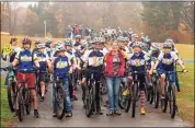  ?? ?? The Ledyard Middle School Bike Club at the starting line of an event with coach Kristen Gallagher.